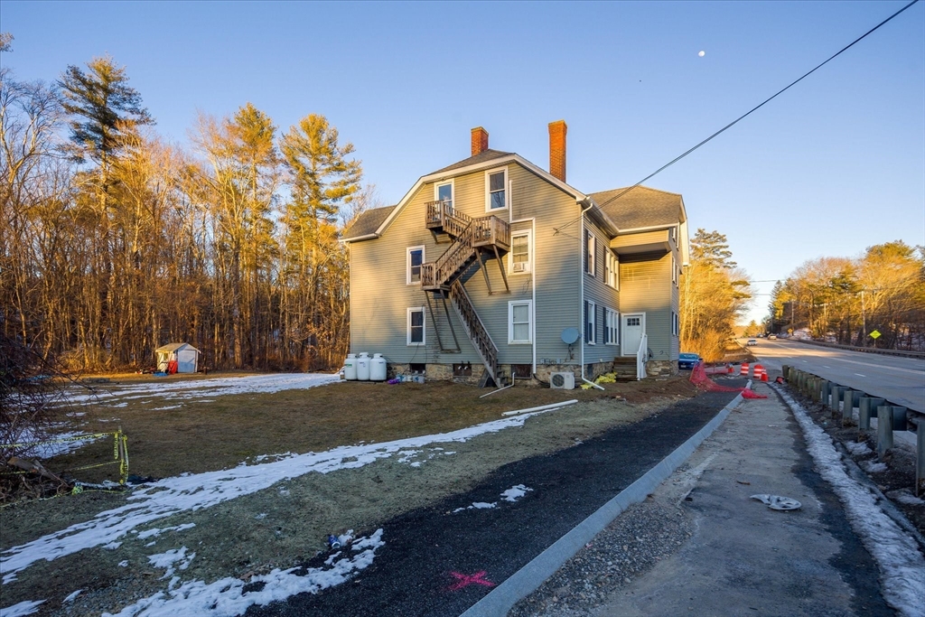 40 Sturbridge Road Charlton, MA 01507 - Photo 3 of 21 a front view of a house with a yard