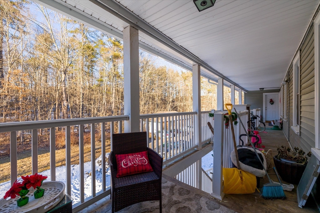 40 Sturbridge Road Charlton, MA 01507 - Photo 7 of 21 a view of a porch with furniture