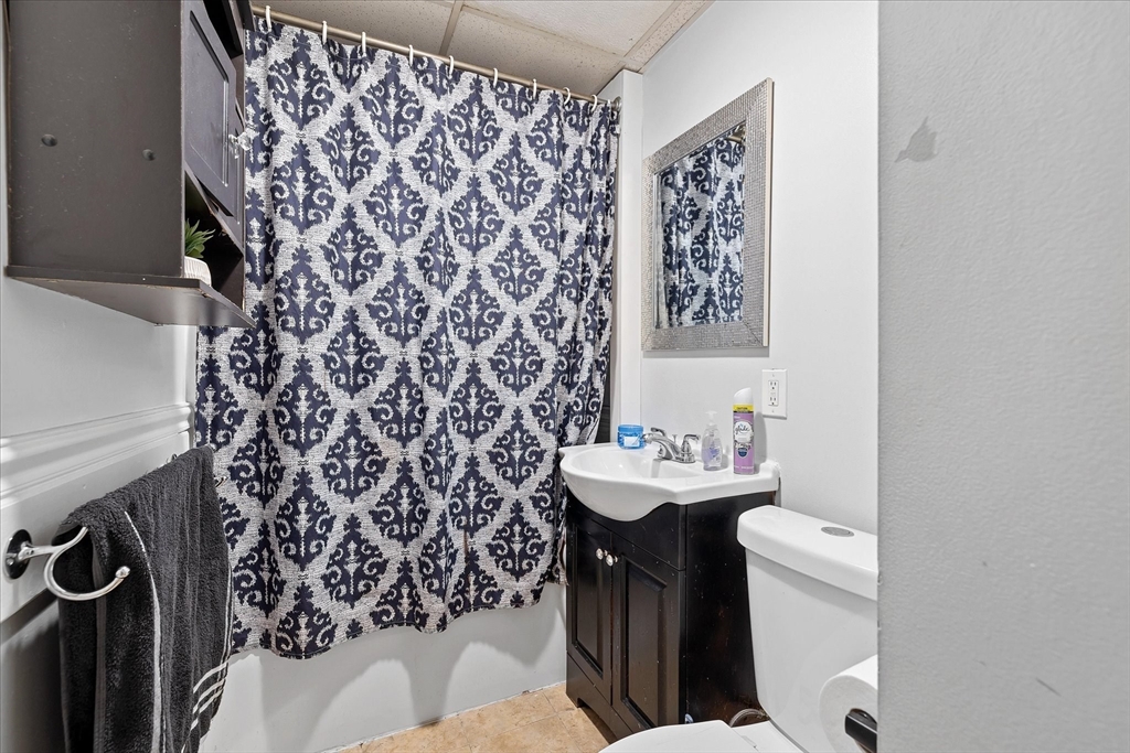 40 Sturbridge Road Charlton, MA 01507 - Photo 10 of 21 a bathroom with a sink toilet and a mirror