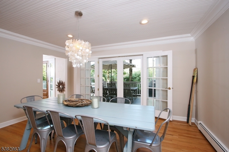 107 Lake End Road Newfoundland, NJ 07435 - Photo 11 of 23 a view of a dining room with furniture window and wooden floor