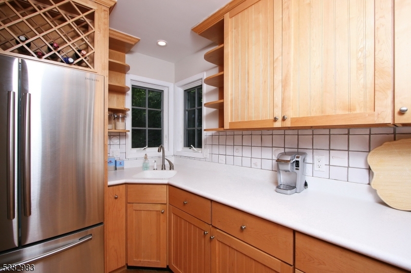 107 Lake End Road Newfoundland, NJ 07435 - Photo 12 of 23 a kitchen with a refrigerator and a sink