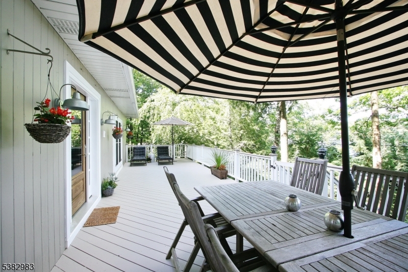 107 Lake End Road Newfoundland, NJ 07435 - Photo 2 of 23 a view of a patio on the roof deck