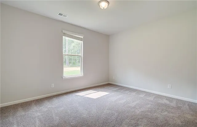 an empty room with a window