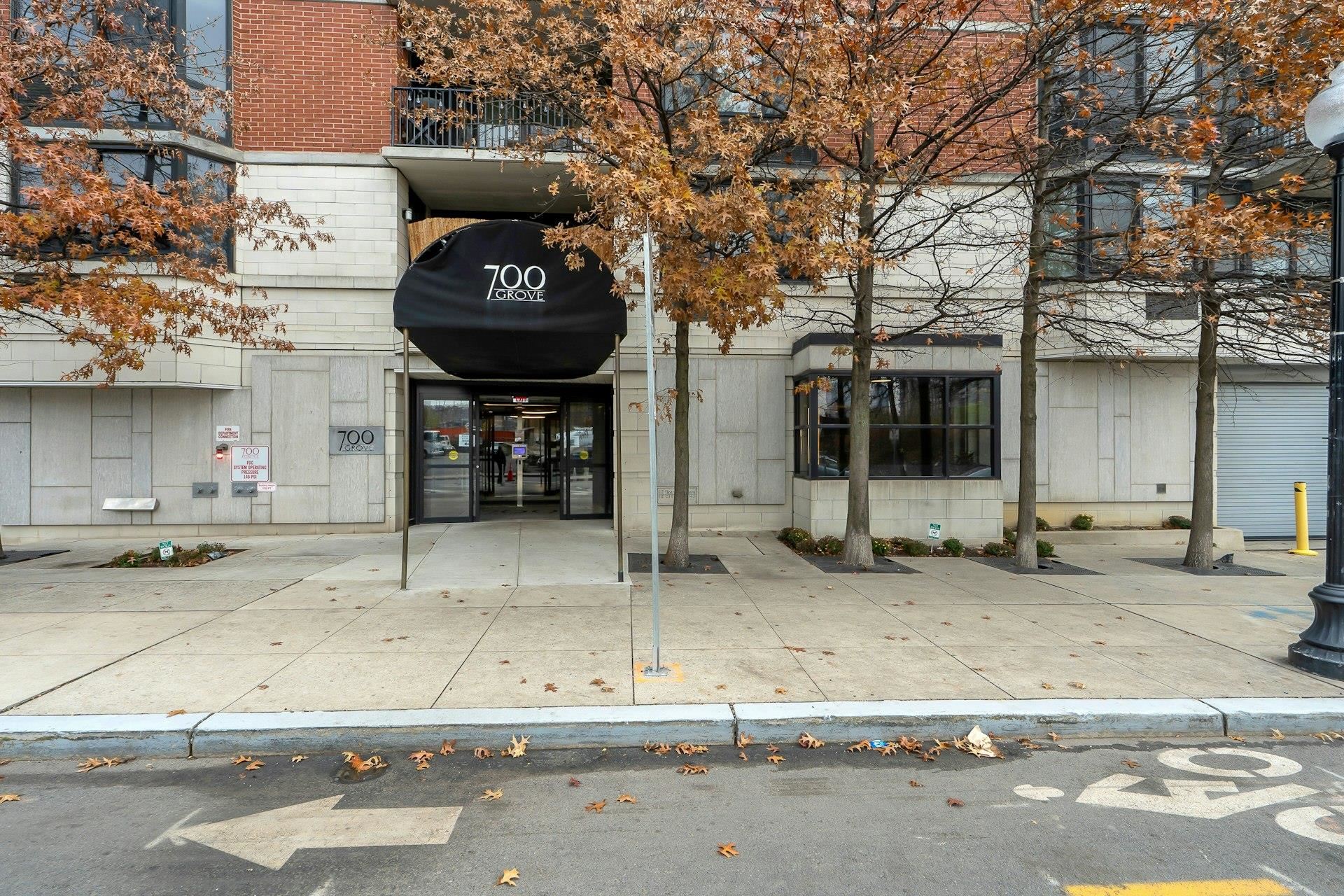 700 Grove Street, Unit 4V Jersey City, NJ 07310 - Photo 17 of 25 a front view of a building with sitting area