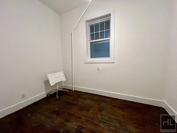 an empty room with a workspace