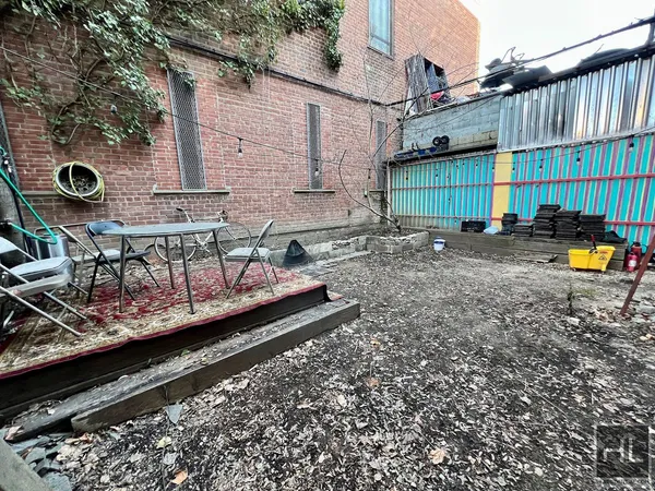 a view of a wooden deck with a bench
