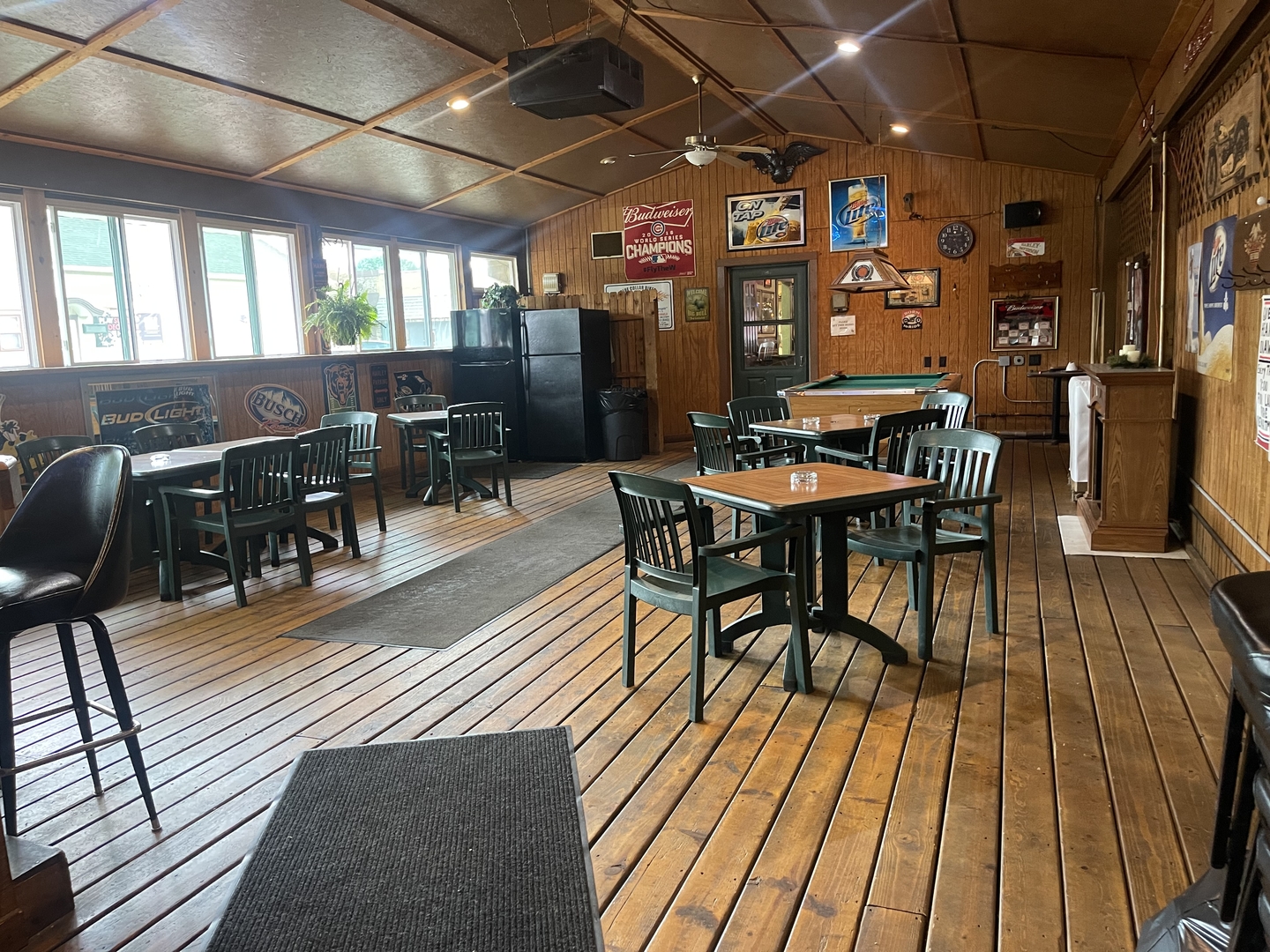 246 North Main Street Ladd, IL 61329 - Photo 13 of 14 a view of a patio with table and chairs with wooden floor