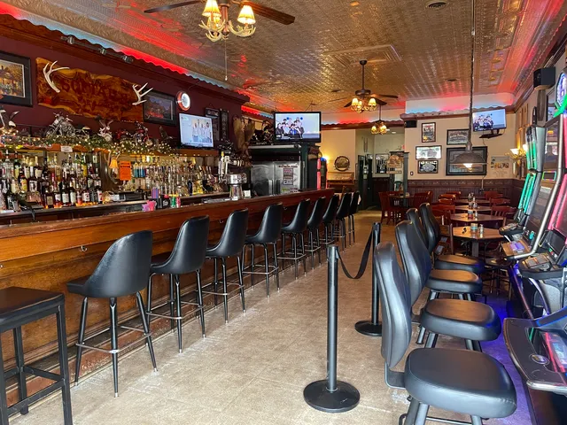 a view of a chairs and tables in a patio