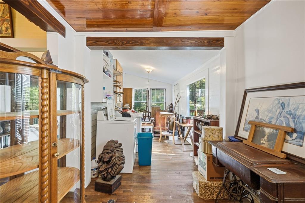 348 Old Tate Road Jasper, GA 30143 - Photo 17 of 35 a living room with furniture and wooden floor