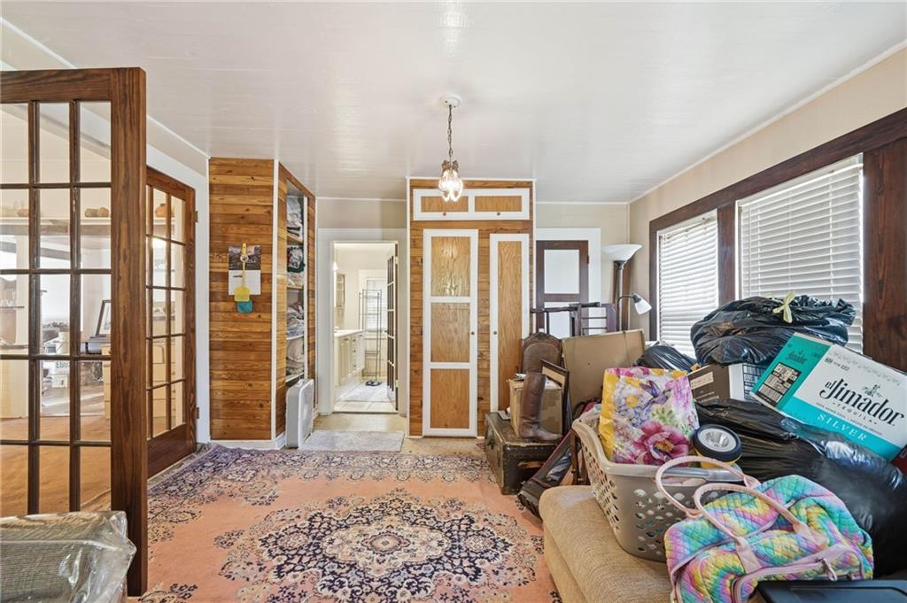 348 Old Tate Road Jasper, GA 30143 - Photo 27 of 35 a bedroom with furniture and a bed