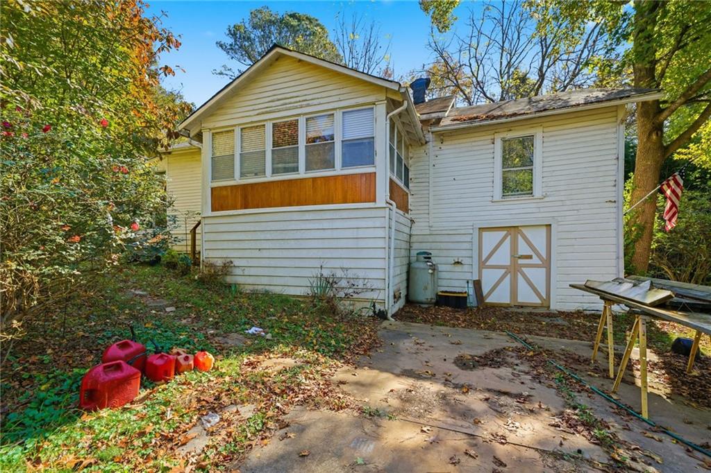 348 Old Tate Road Jasper, GA 30143 - Photo 33 of 35 a front view of a house with a yard