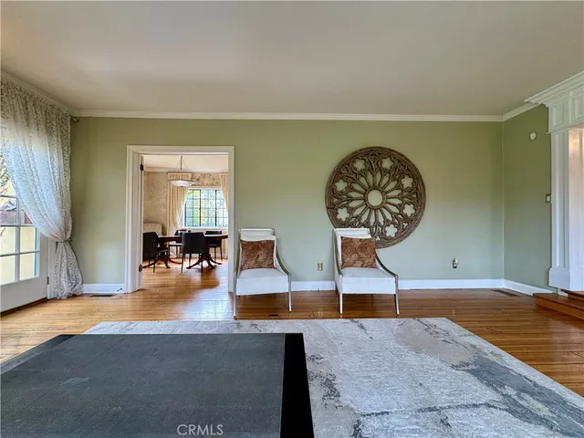 a view of a livingroom with furniture and windows