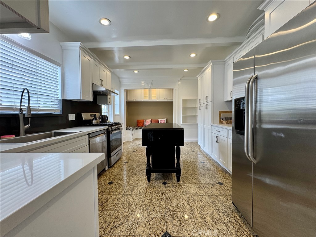 1149 Cordova Avenue Glendale, CA 91207 - Photo 13 of 65 a kitchen with a refrigerator and a sink