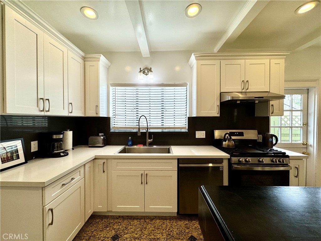 1149 Cordova Avenue Glendale, CA 91207 - Photo 16 of 65 a kitchen with a stove a sink and a microwave