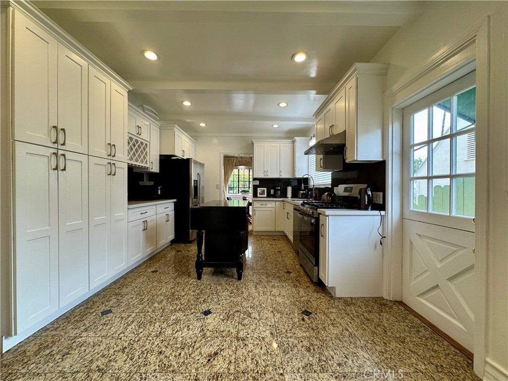 1149 Cordova Avenue Glendale, CA 91207 - Photo 18 of 65 a kitchen with sink cabinets and refrigerator