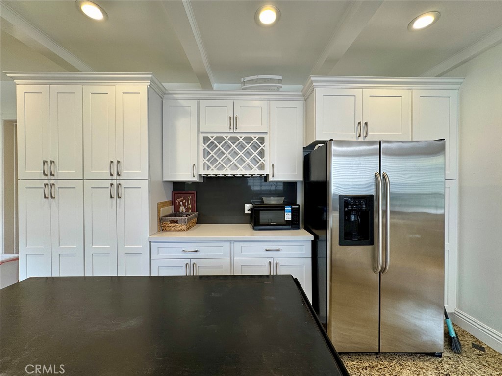 1149 Cordova Avenue Glendale, CA 91207 - Photo 19 of 65 a kitchen with stainless steel appliances granite countertop a refrigerator and a stove