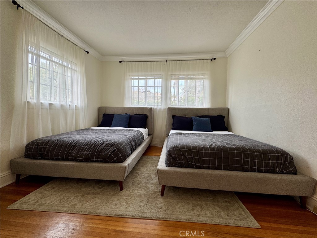 1149 Cordova Avenue Glendale, CA 91207 - Photo 25 of 65 a bedroom with a bed and window