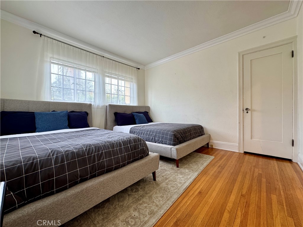 1149 Cordova Avenue Glendale, CA 91207 - Photo 26 of 65 a bedroom with double bed and a window