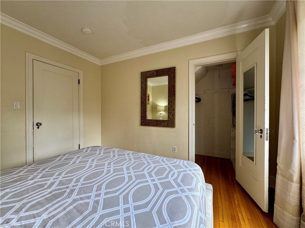 1149 Cordova Avenue Glendale, CA 91207 - Photo 31 of 65 a bedroom with a bed and a dresser