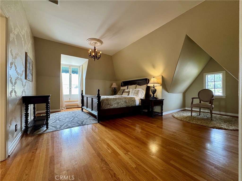 1149 Cordova Avenue Glendale, CA 91207 - Photo 37 of 65 a living room with furniture and a wooden floor