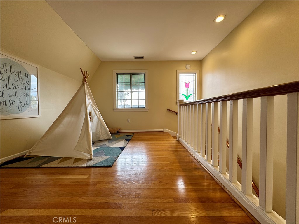 1149 Cordova Avenue Glendale, CA 91207 - Photo 43 of 65 a view of a livingroom with wooden floor and stairs