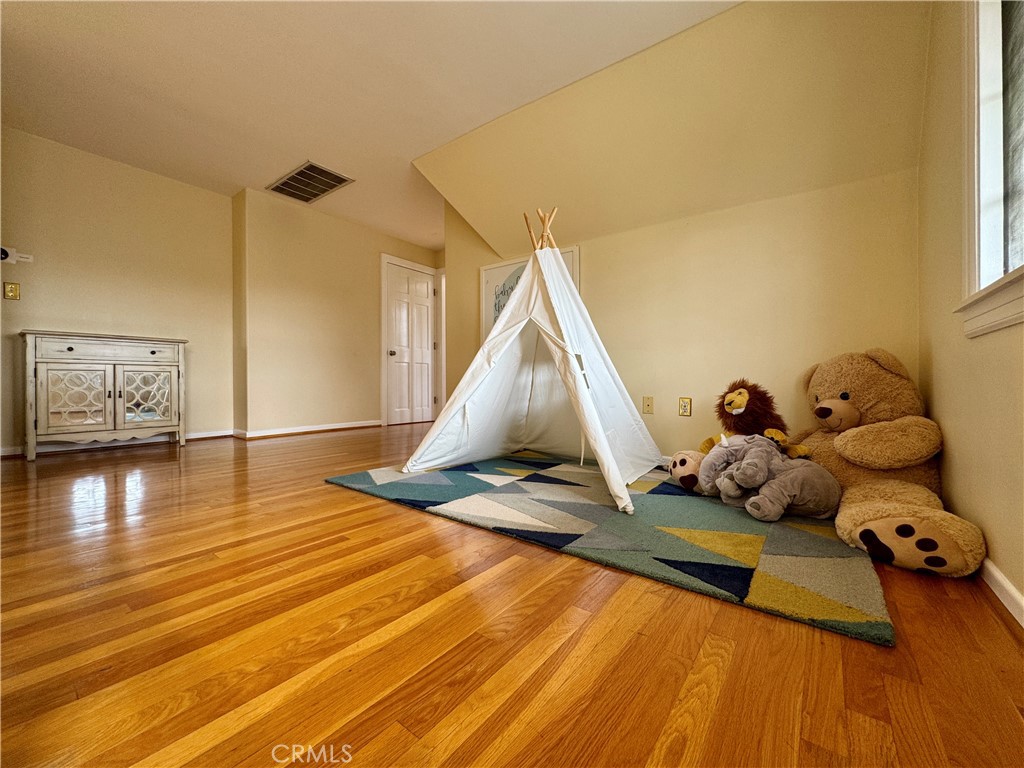 1149 Cordova Avenue Glendale, CA 91207 - Photo 44 of 65 a room with gym equipment and wooden floor