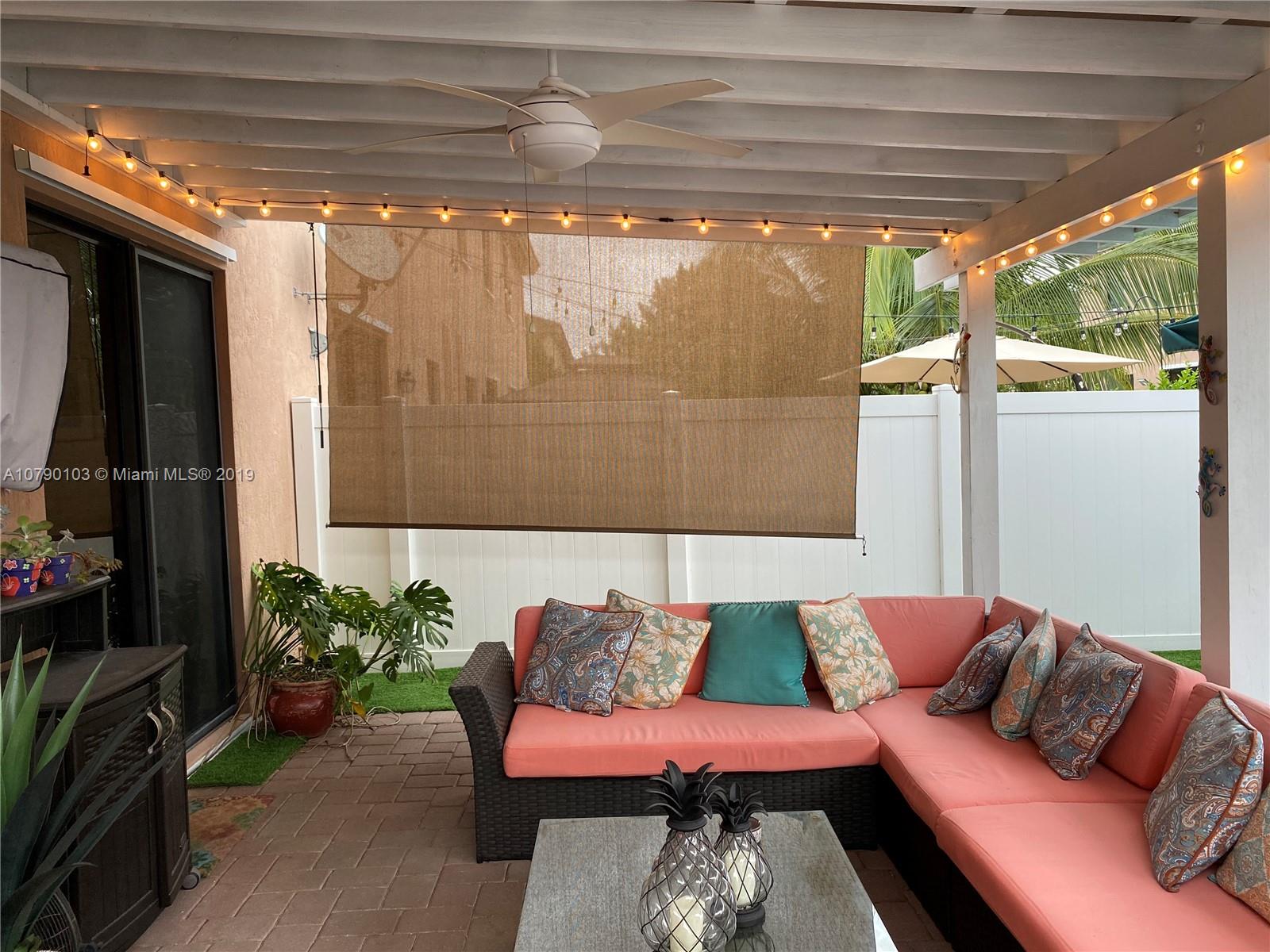 3436 West 90th Street, Unit 3436 Hialeah, FL 33018 - Photo 16 of 56 a outdoor living with furniture