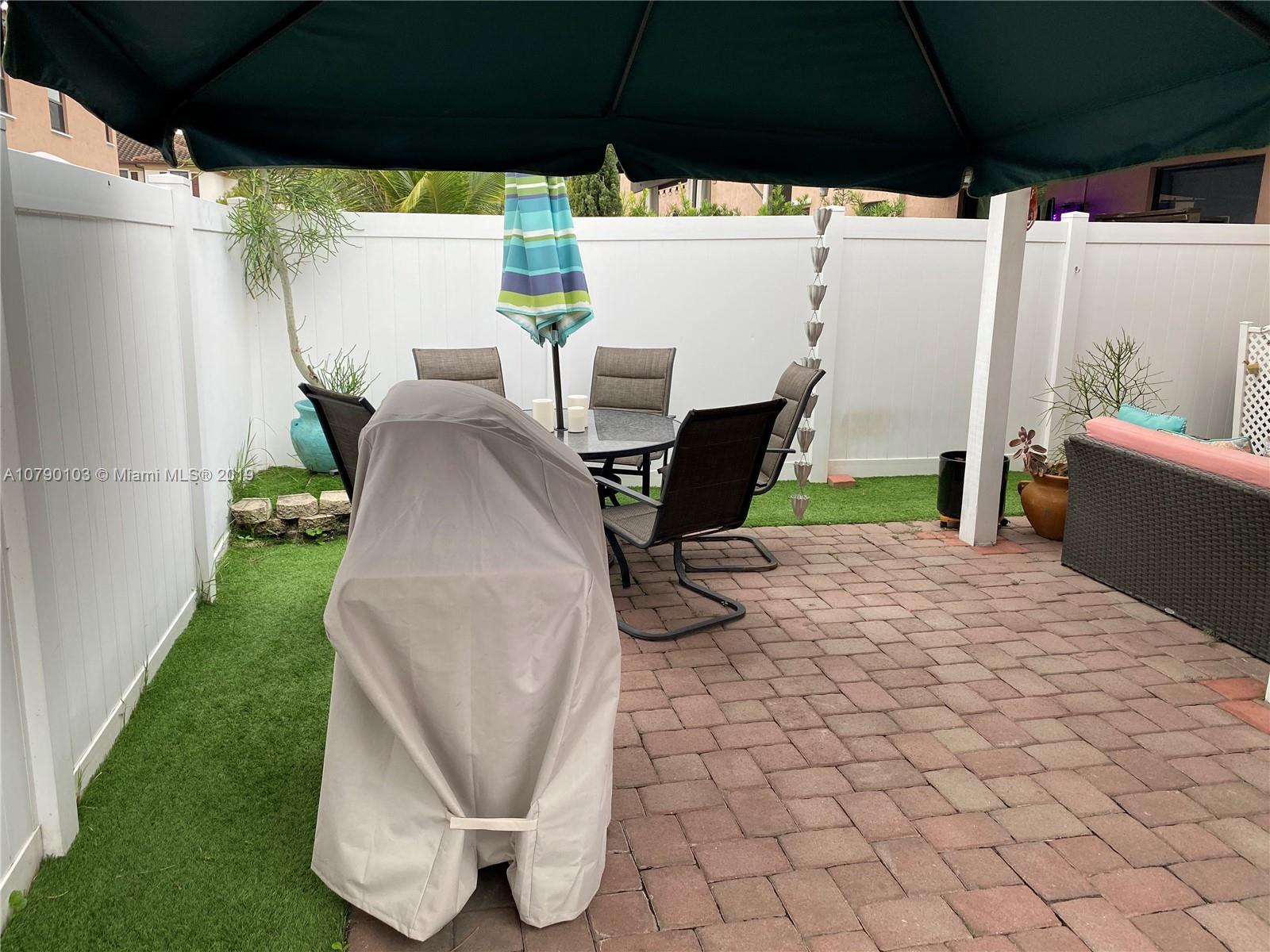 3436 West 90th Street, Unit 3436 Hialeah, FL 33018 - Photo 23 of 56 a view of outdoor space and yard
