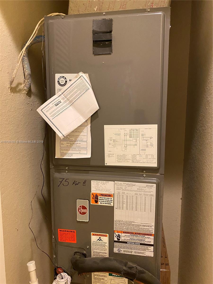 3436 West 90th Street, Unit 3436 Hialeah, FL 33018 - Photo 42 of 56 a view of water heater