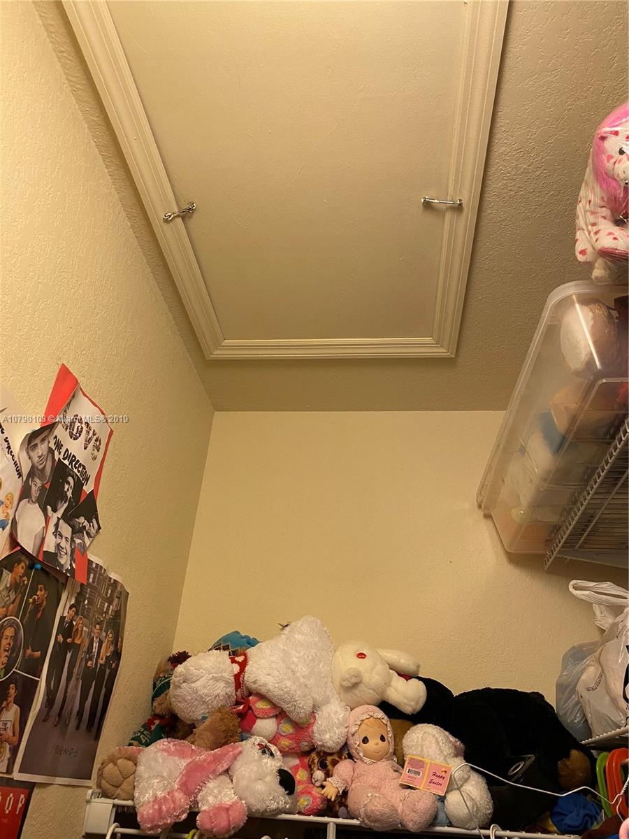 3436 West 90th Street, Unit 3436 Hialeah, FL 33018 - Photo 47 of 56 a bedroom with a bed and the view of bedroom