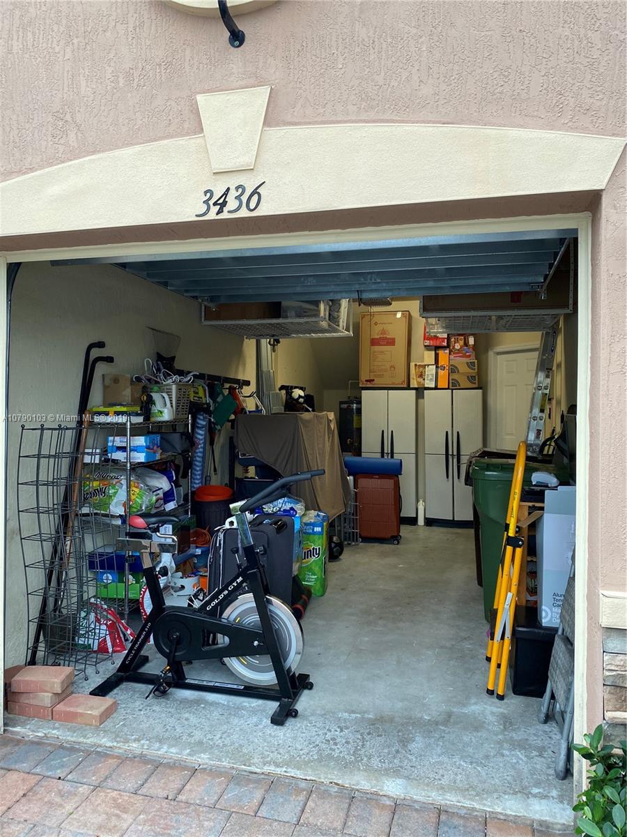 3436 West 90th Street, Unit 3436 Hialeah, FL 33018 - Photo 52 of 56 a view of a room with gym equipment