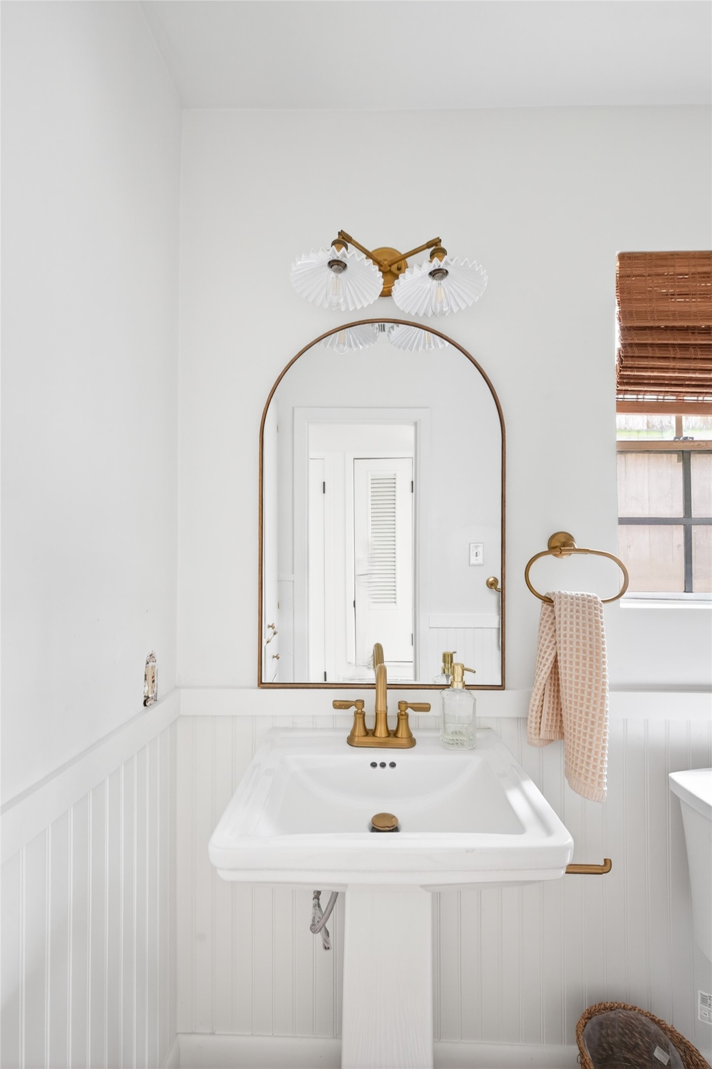 1700 Houston Street, Unit 102 Austin, TX 78756 - Photo 15 of 24 a bathroom with a sink and a mirror