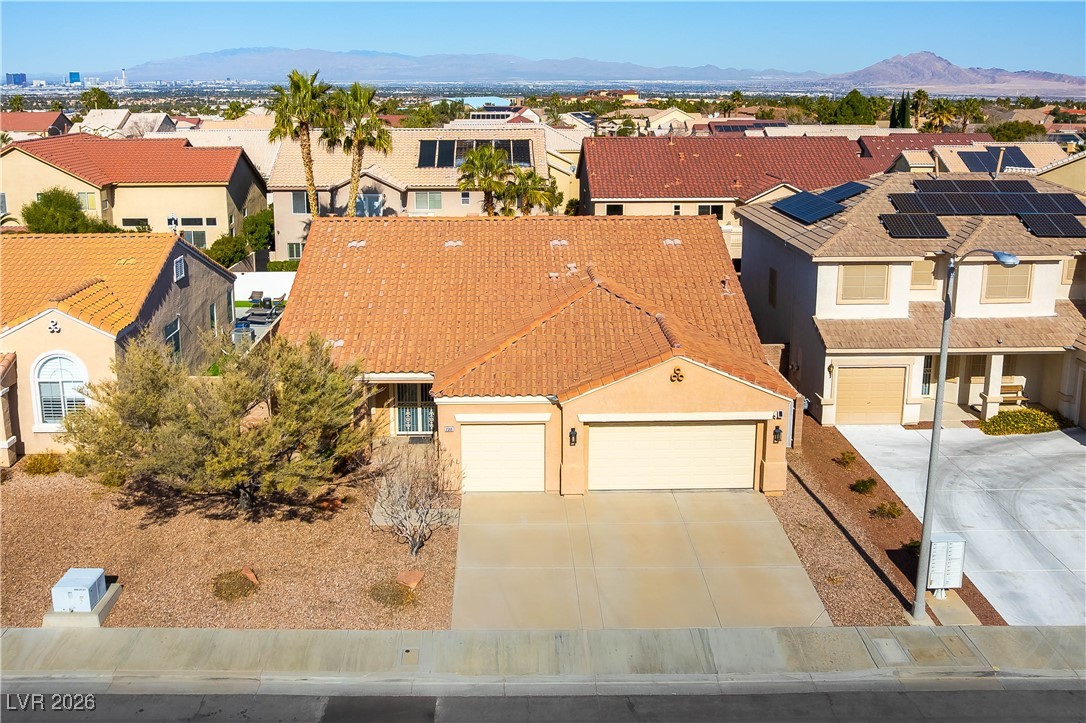 2344 Teton Ranch Avenue Henderson, NV 89052 - Photo 24 of 32 Aerial view of residential with mountain backdrop