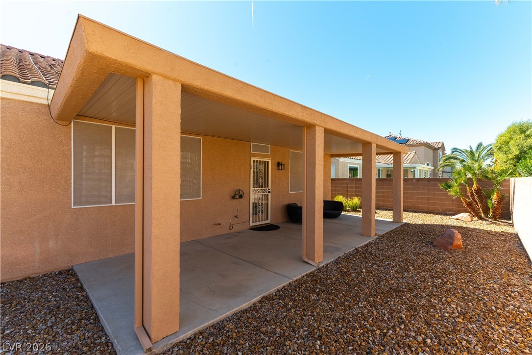 2344 Teton Ranch Avenue Henderson, NV 89052 - Photo 26 of 32 Fenced backyard featuring a patio area