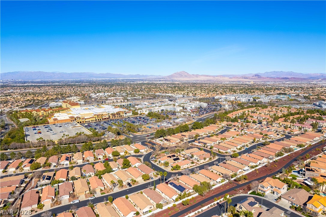 2344 Teton Ranch Avenue Henderson, NV 89052 - Photo 31 of 32 Aerial perspective of suburban area featuring a mountain backdrop
