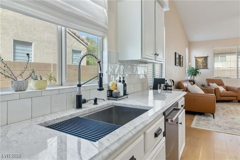 2344 Teton Ranch Avenue Henderson, NV 89052 - Photo 5 of 32 Lovely quartz countertop and deep sink