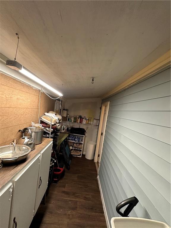 201 North King Street Calhoun, GA 30701 - Photo 13 of 13 a kitchen with a stove and a wooden floor