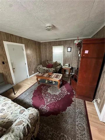 a bed room with a bed and a mirror