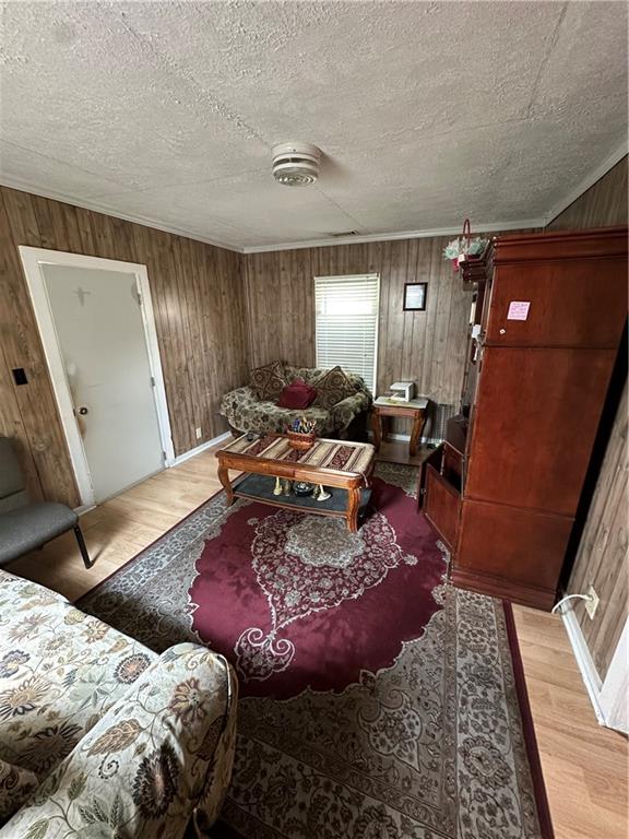 201 North King Street Calhoun, GA 30701 - Photo 6 of 13 a bed room with a bed and a mirror