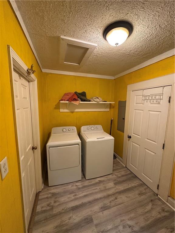 201 North King Street Calhoun, GA 30701 - Photo 10 of 13 a view of utility room with washer and dryer