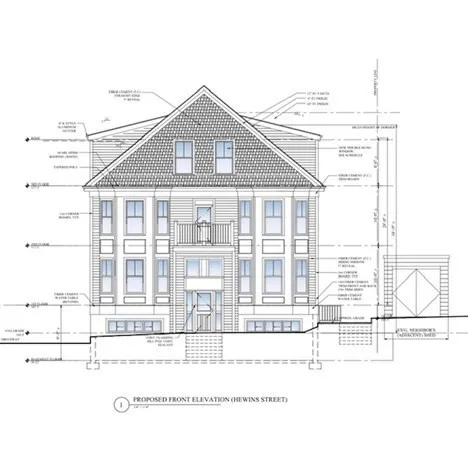 a black and white photo of a house