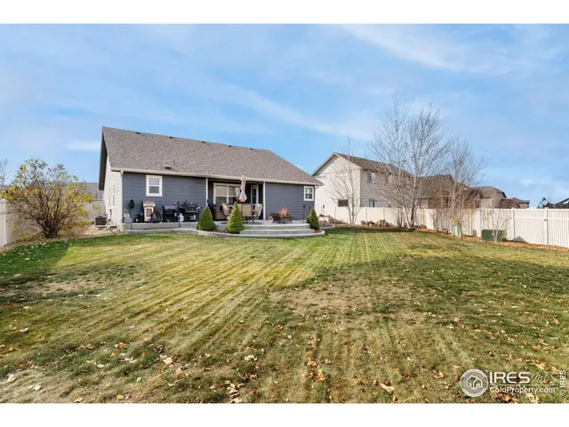 a view of a house with a big yard