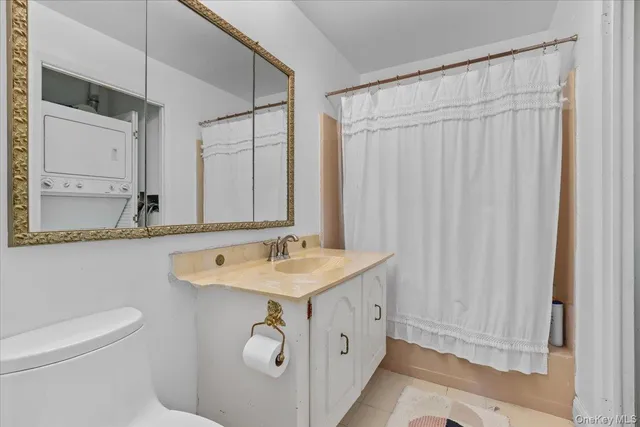 a bathroom with a sink a mirror and a toilet