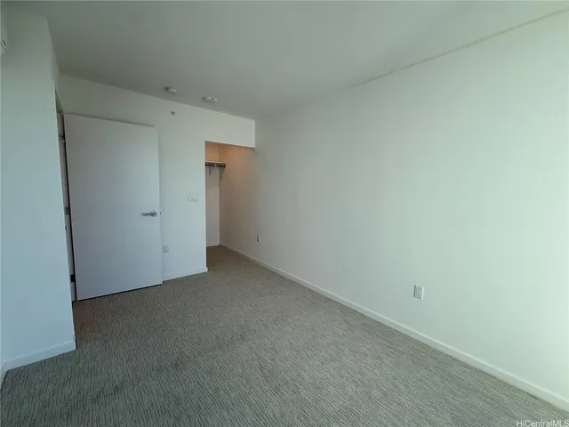 a view of a room with large windows