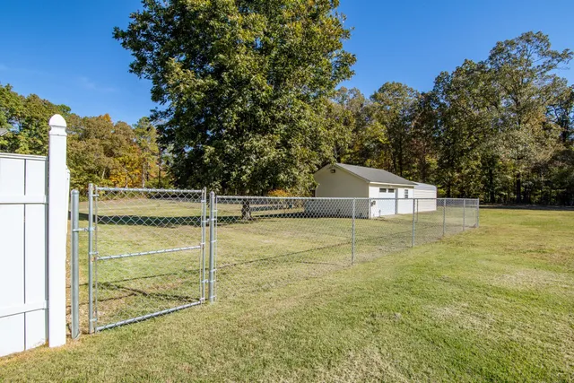 a house with trees in front of it