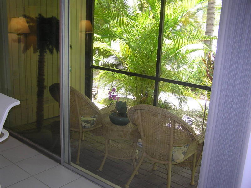 591 Sombrero Beach Road, Unit 8 Marathon, FL 33050 - Photo 14 of 21 SCREENED PORCH FROM INSIDE