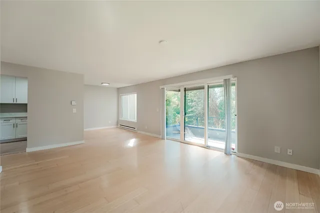 a view of an empty room with a window