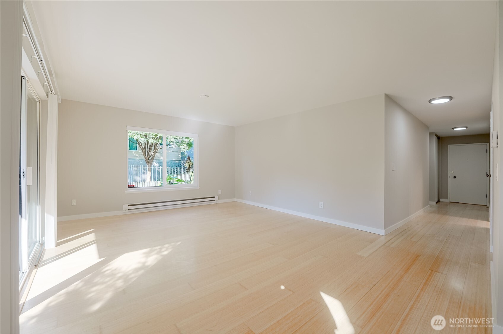 1100 South Atlantic Street, Unit 209 Seattle, WA 98134 - Photo 16 of 31 an empty room with windows