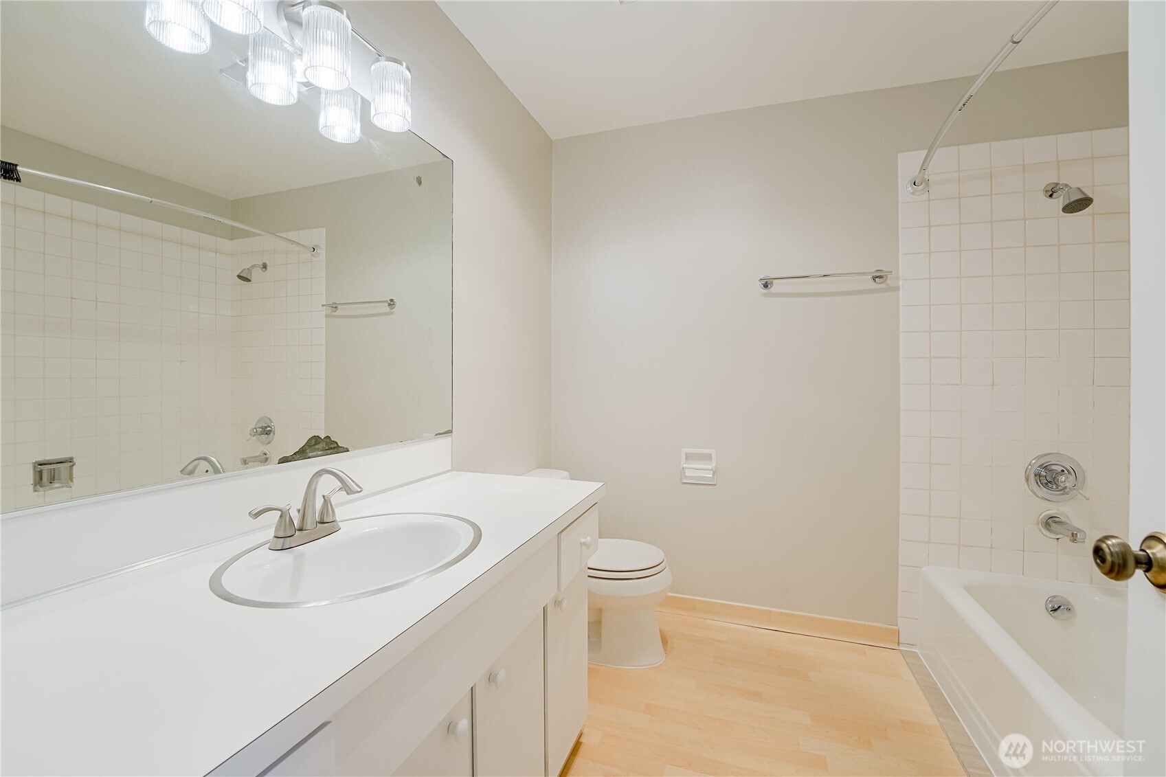 1100 South Atlantic Street, Unit 209 Seattle, WA 98134 - Photo 18 of 31 a bathroom with a sink a toilet and shower
