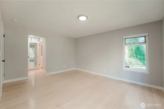 a bathroom with a sink vanity and a mirror